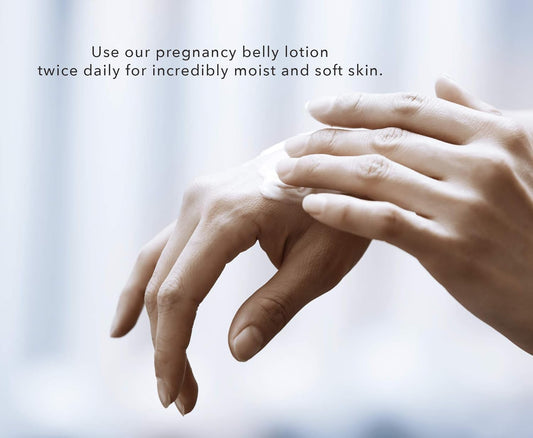 Close-up of hands with text promoting pregnancy belly lotion.