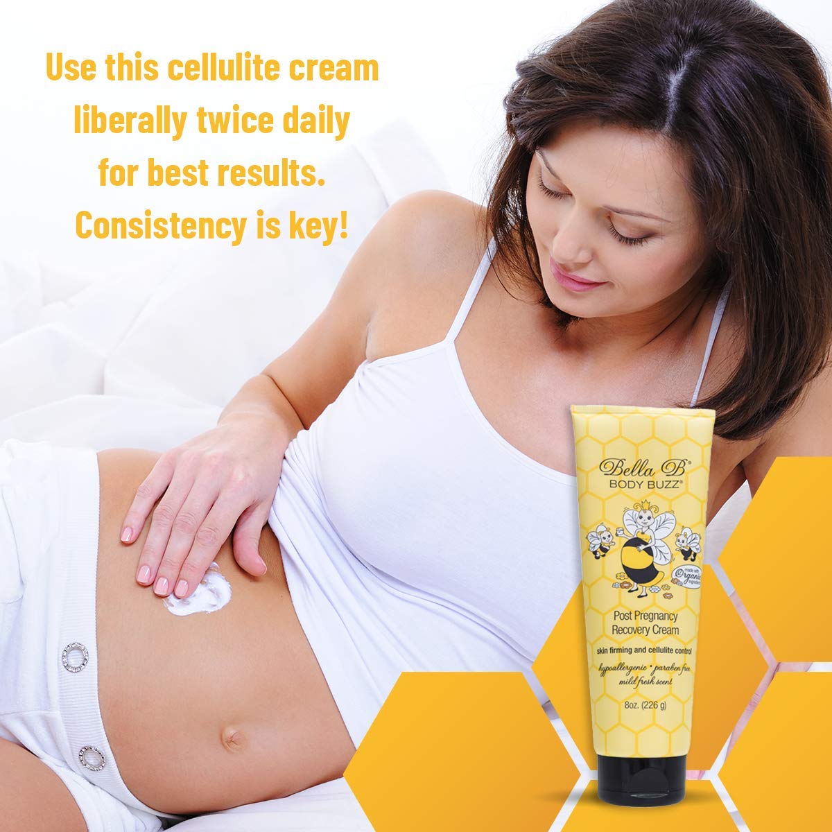Woman applying cellulite cream to her abdomen with a tube of Bella B Body Butter