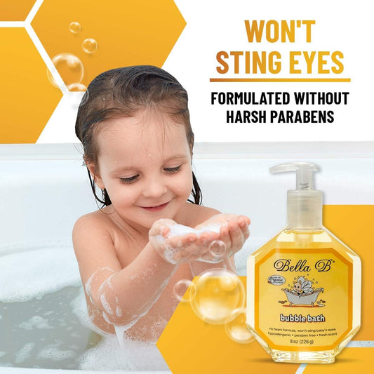 Child playing with bubble bath, Bella B brand visible