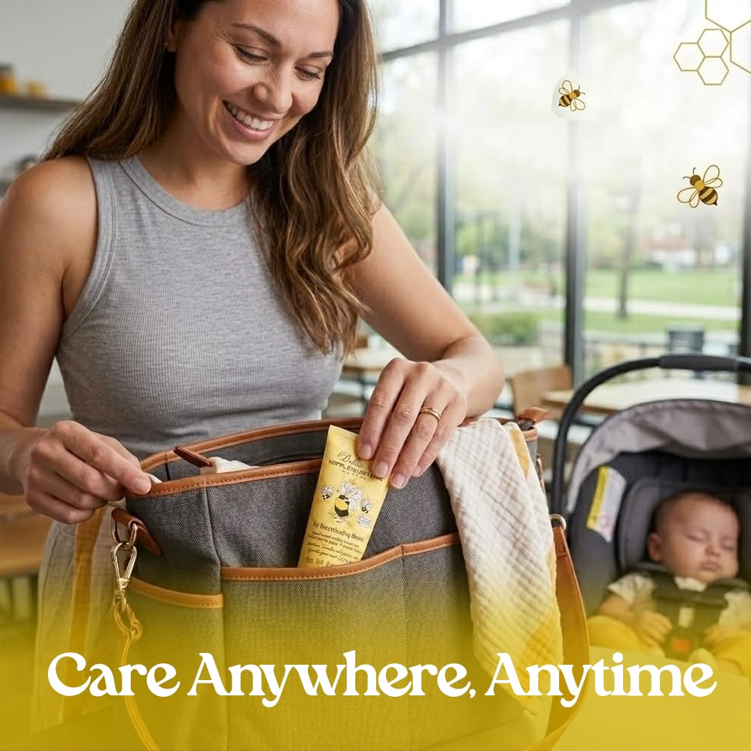 Woman with a baby in a car seat, holding a bag