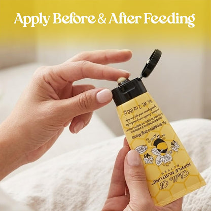 Hand holding a yellow tube of baby lotion with text 'Apply Before & After Feeding' 